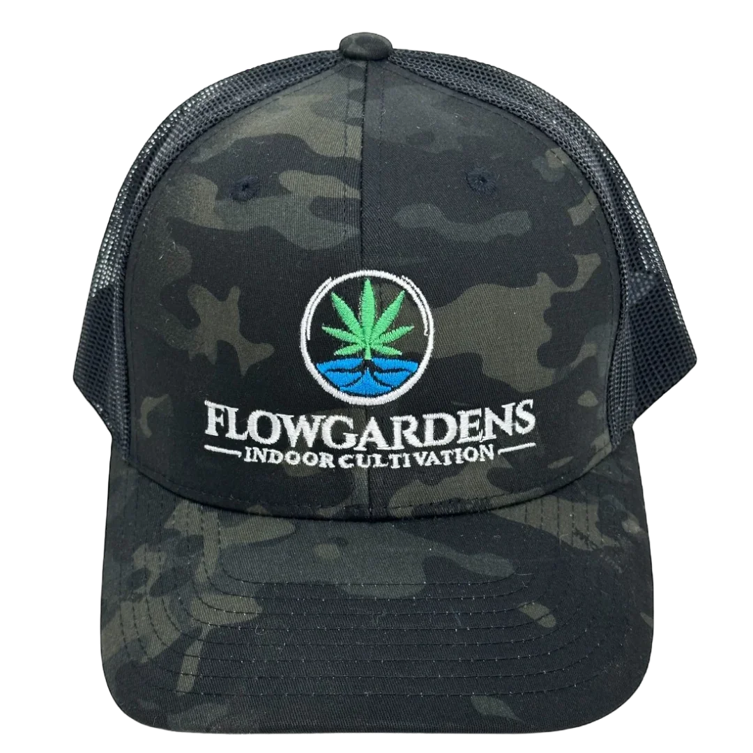 Black camo mesh trucker hat with Flowgardens Indoor Cultivation logo and cannabis leaf