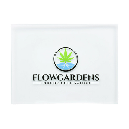 Rectangular glass rolling tray with Flow Gardens logo