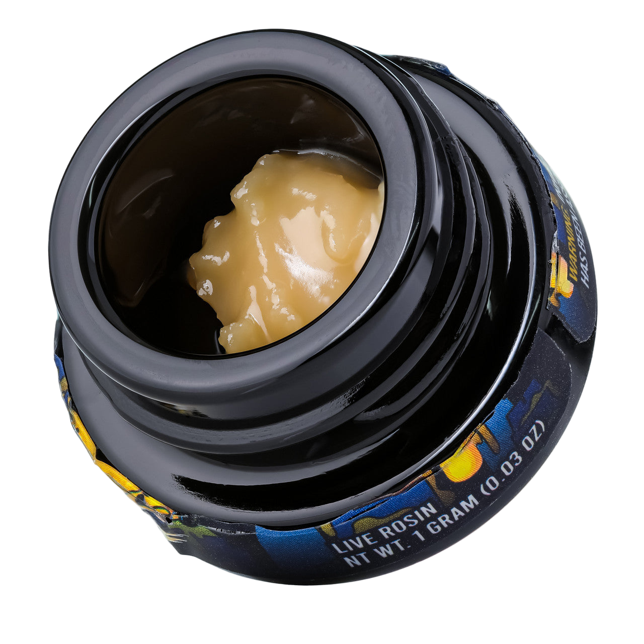 Close-up of a container with a small amount of live rosin inside